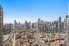 Apartment in Dubai - A Slice of Luxury: 3-Bedroom Bliss in Downtown, Burj Khalifa in Sight